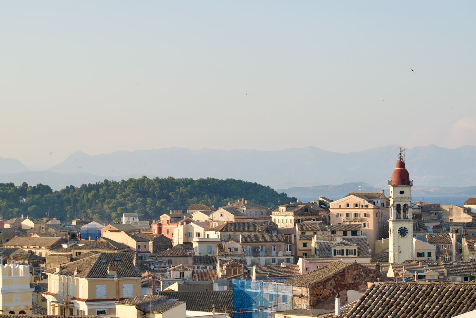 Panoramic view of Corfu Old Town and the bell tower of Agios Spyridon at golden hour