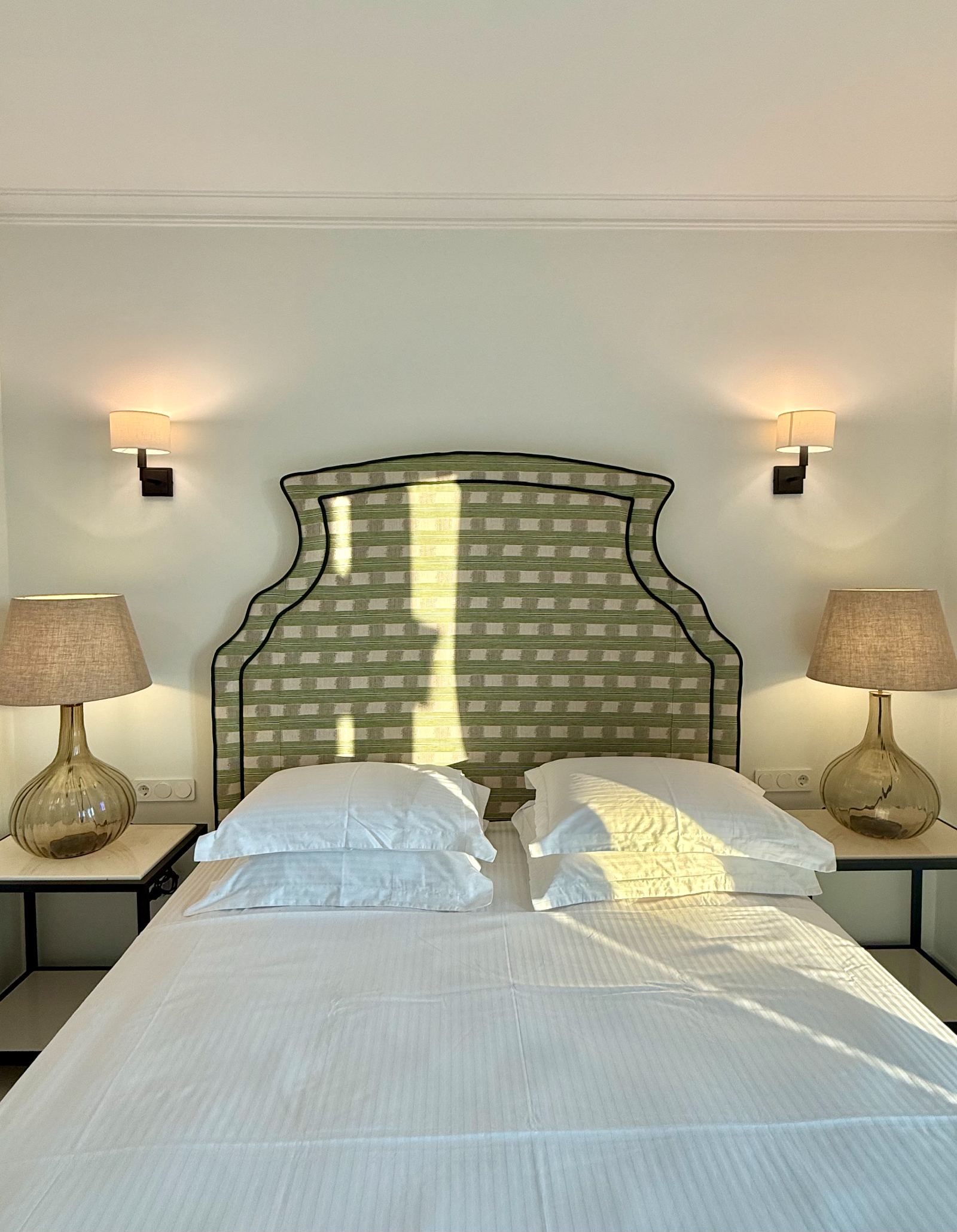 Double bedroom with green check headboard